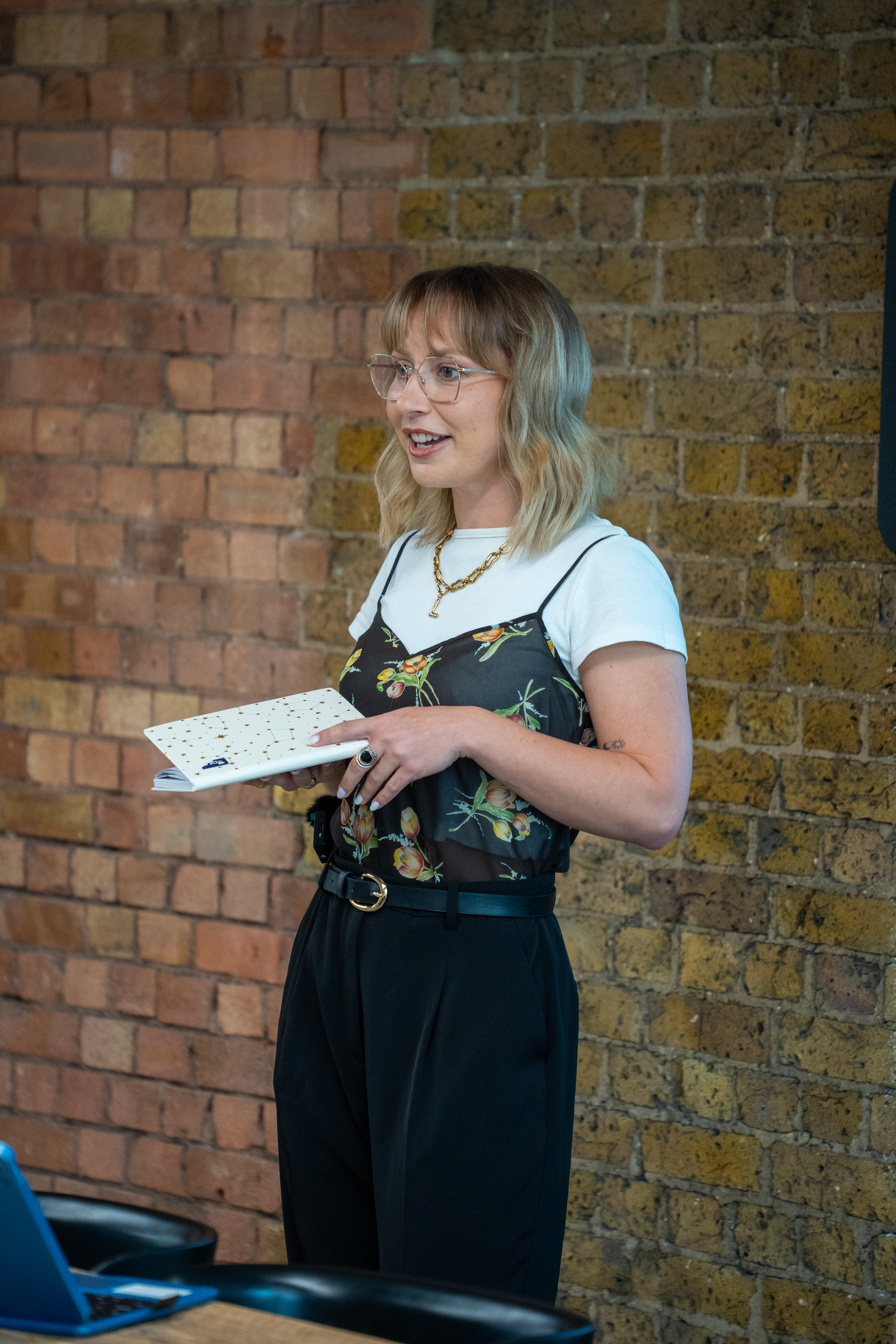 Lucy Twilley of Clear About Menstrual Health delivering menstrual health and period awareness training to a workplace team